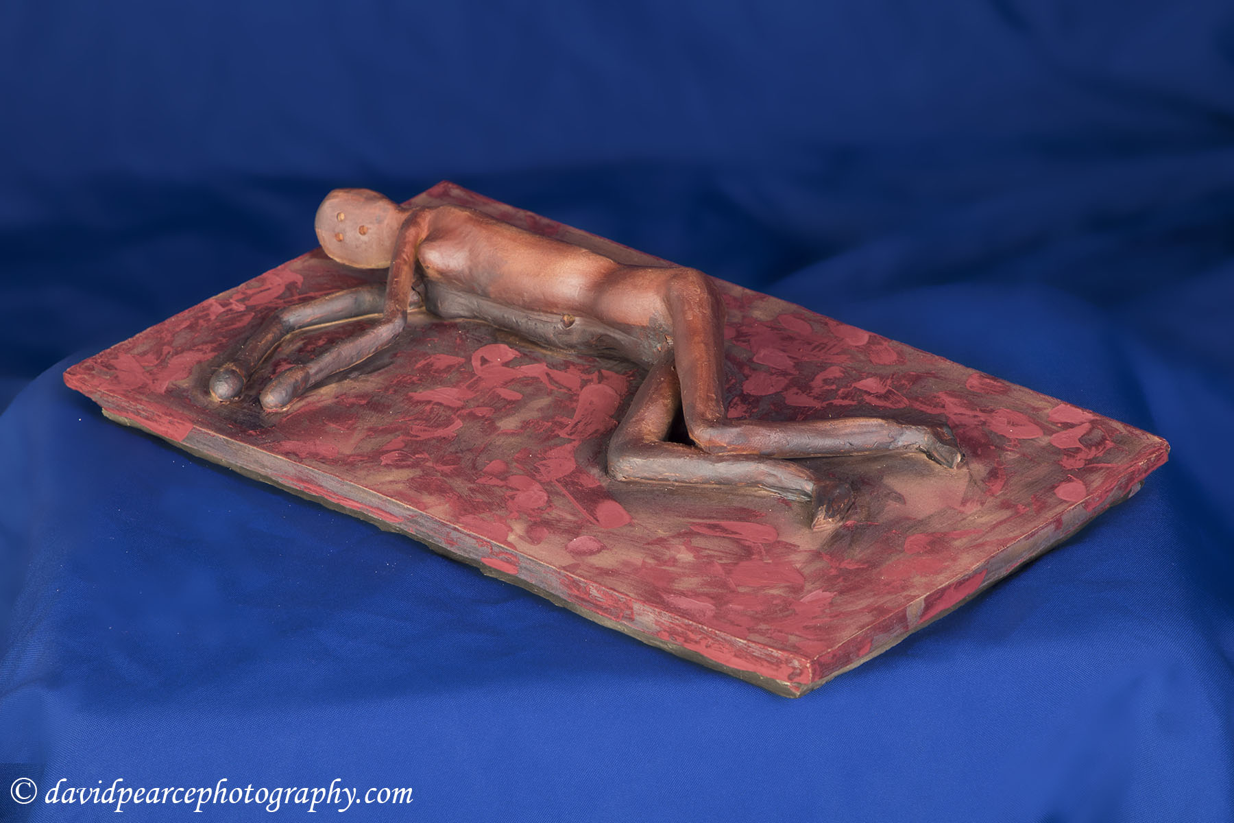 Clay Recling Figure